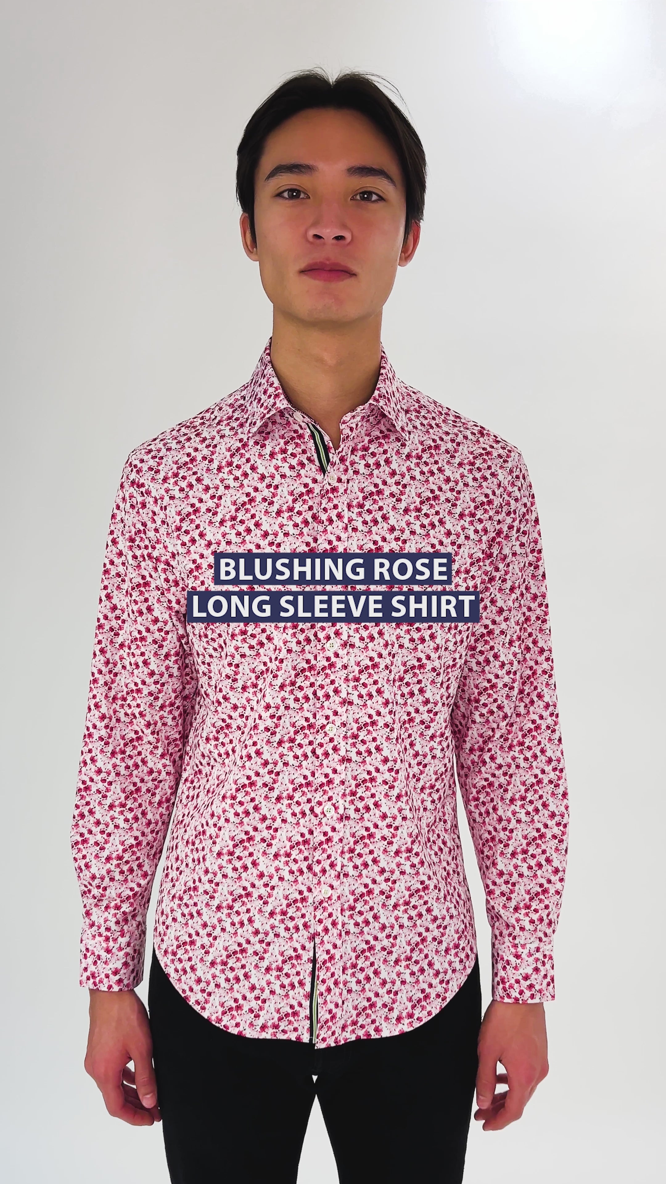 Man jumping and switching floral shirts